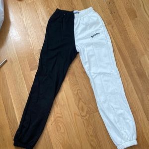 Black and white sweatpants size extra small.